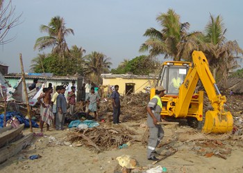 A JCB backhoe loader clearing up after the 2004 Tsunami